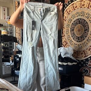 Fashion Nova Light Blue Distressed Flare Jeans